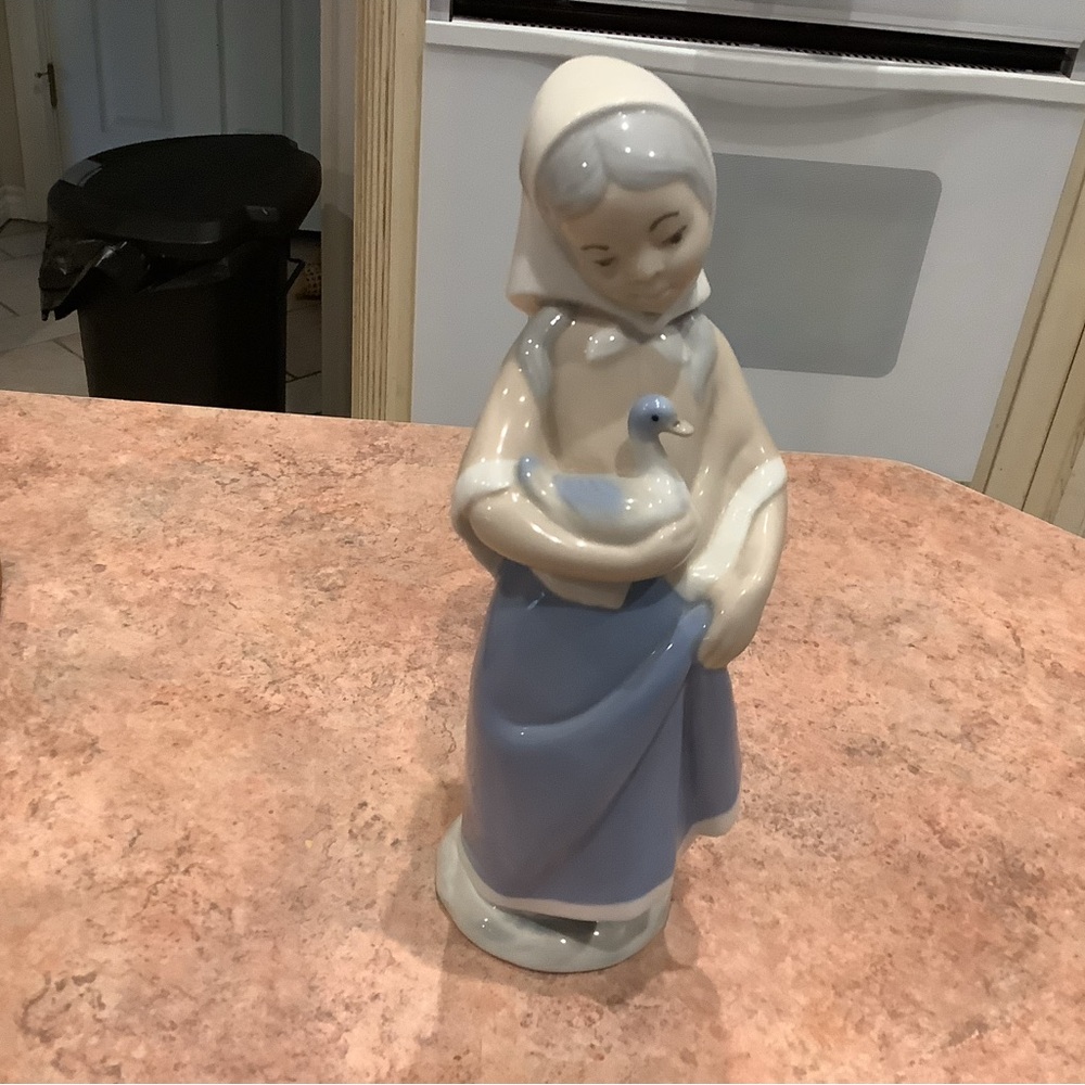 Porcelain Figurine with Blue and White Dress Hummelwork ‘94
